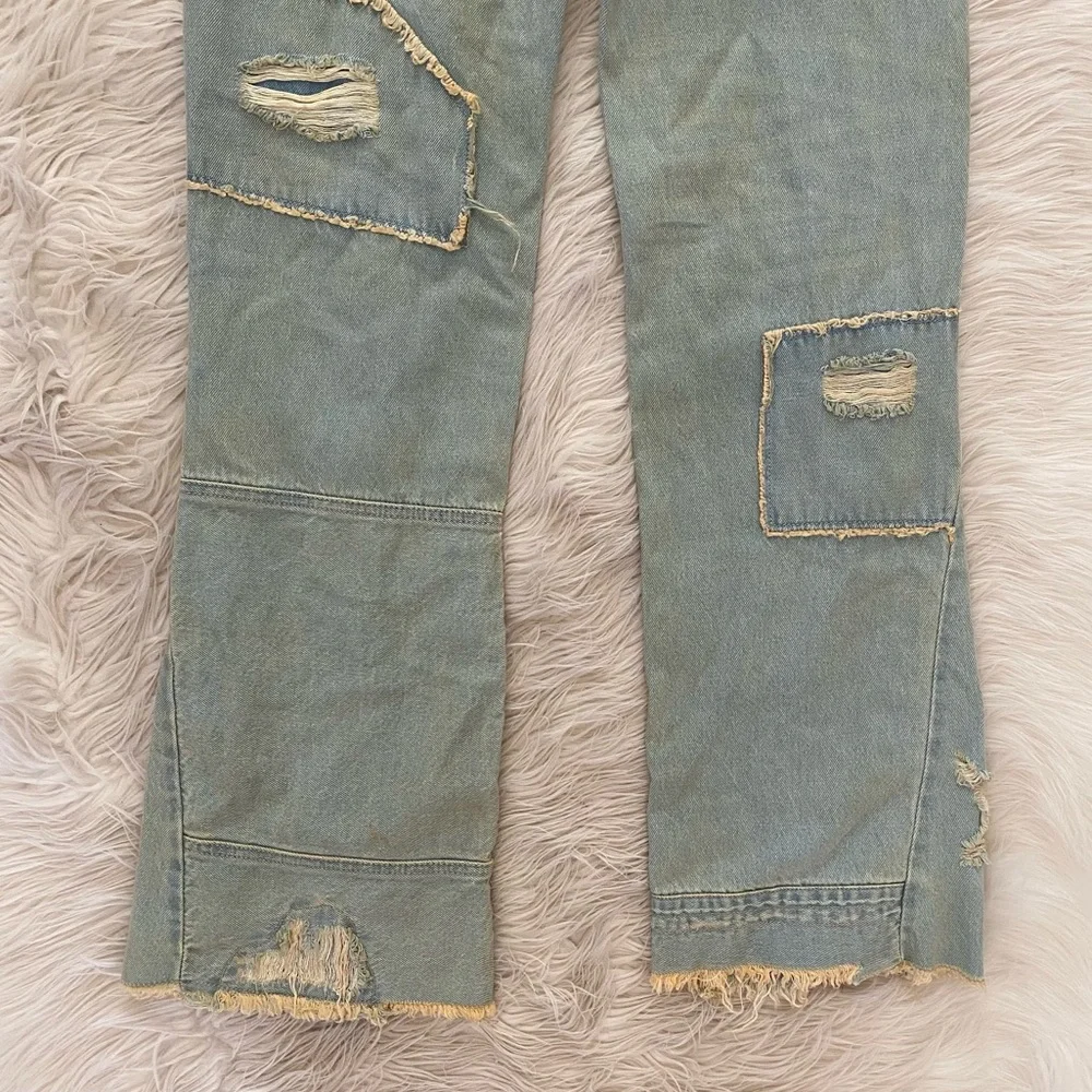 Urban Outfitters BDG Extreme Destroyed Bootcut Jean Mid Rise Rigid Denim Jeans